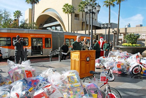 Metro Gift Giving Drive Metro CEO Art Leahy presides over donation of gifts for skid row kids and families. Photo by Luis Inzunza