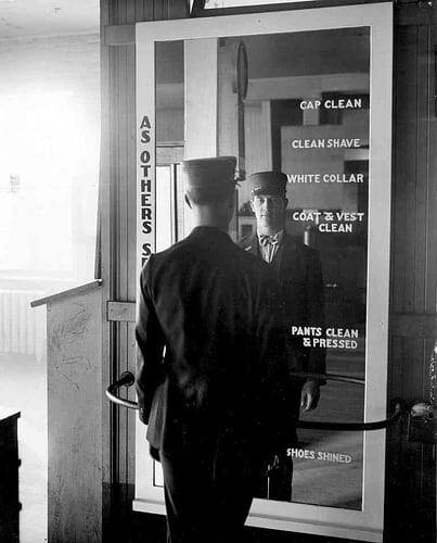 Man at Division 3 mirror: 1930s Man at Division 3 mirror: 1930s.