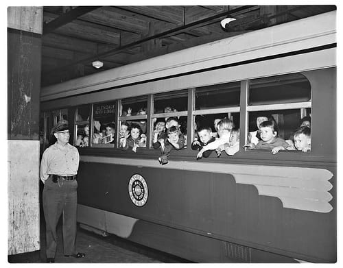 School children on last subway ride, 1955. School children on last subway ride, 1955.