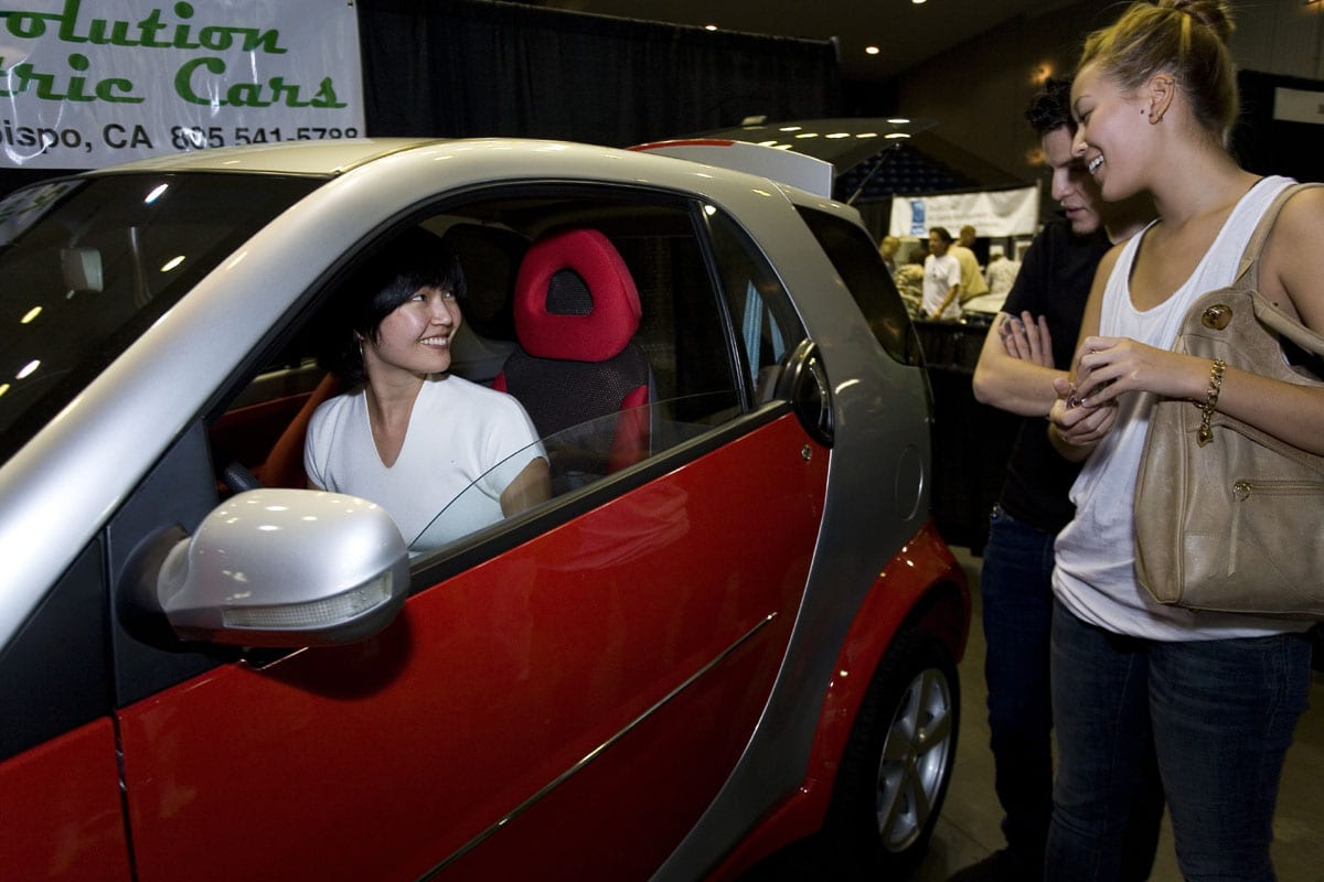 Woman In Red Car