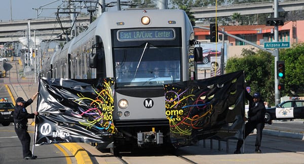 mglBanner3057 Inaugural train arrives at the Metro Gold Line East L.A. Civic Center Station for opening day. The six-mile Metro Gold Line Eastside Extension links East L.A. with downtown Los Angeles and Pasadena in the 79.1-mile Metro Rail system that traverses Los Angeles County. (Photo by gary Leonard)