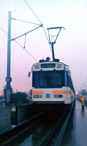 The Overhead Power System failure was caused by a broken section insulator, but the support wire and the train contact wire did not break. The train came to a stop on the Slauson Station grade. Photo by Luis Inzunza