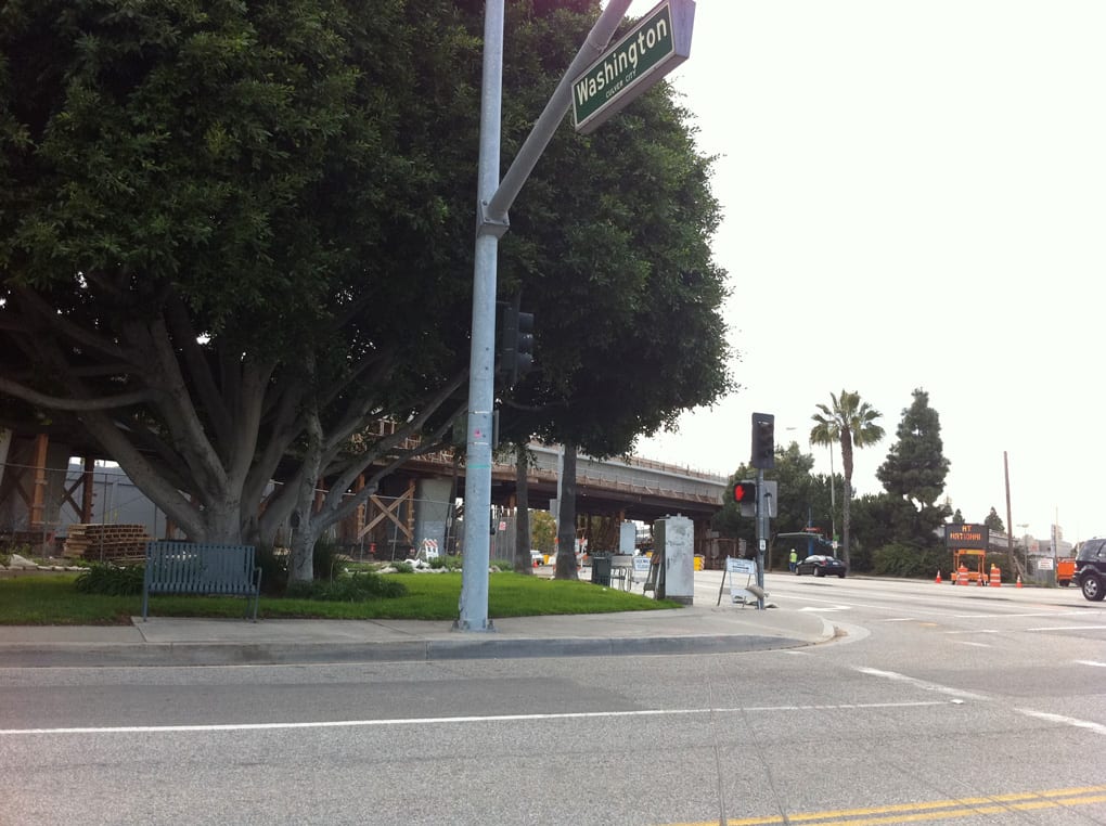 Expo lines tracks cross over Washington Blvd. and duck behind trees before heading towards the Phase 1 terminus at Venice Blvd. in Culver City.
