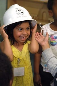 Hard hats fascinated the students. On the following Monday, the contractor halted pile driving from 12:30pm to 2:30pm so students (and parents) would benefit from undisturbed naptime.
