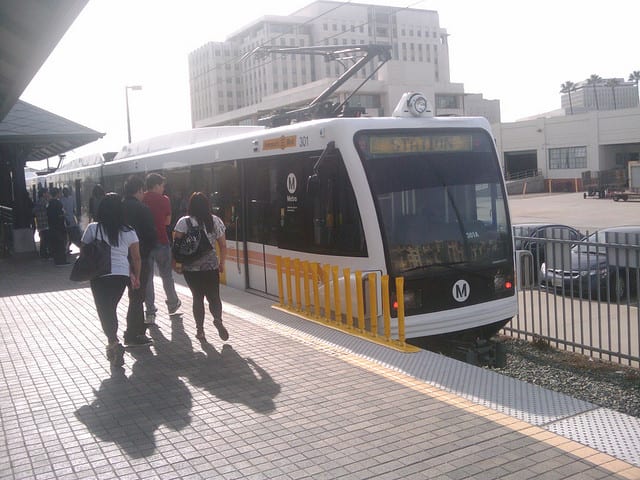 Students board the Gold Line.