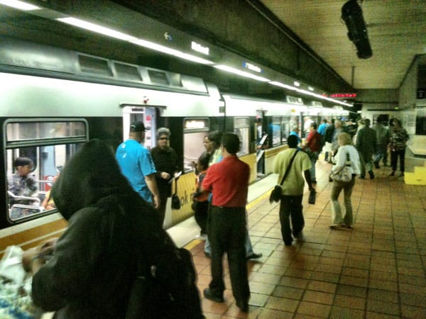 Hardly any lines at 7th/Metro when this photo was taken at 9:35 a.m. but that's changing. Lots of staff on hand directing smooth operation and orderly boarding. Photo: Steve Hymon 