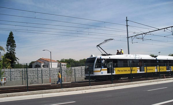 Expo test train, pushed by high-rail truck, performs clearance testing on westbound track near Hayden Boulevard. Photo submitted from Hello Expo Facebook page by Friend of Expo.