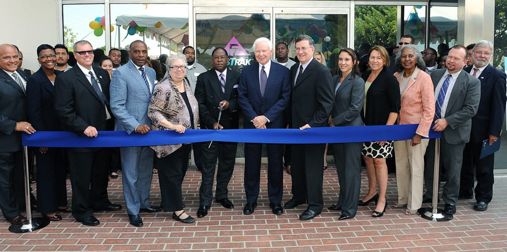 Mark Ridley-Thomas, LA County Supervisor and Metro Board member, leads the ribbon-cutting ceremony July 25 to open the Metro ExpressLanes Customer Service Center. Included among the officials are John Fasana, Duarte Mayor & Metro Board member; Pam O’Connor, Santa Monica City Councilmember, Metro Board member & SCAG Board member; Michael Miles, Caltrans District 7 Executive Director; Art Leahy, Metro CEO; Stephanie Wiggins, Metro EO, Congestion Reduction Initiative Program; Kathleen Daly, Program Manger, AAA Discounts;Jim Thomas, Thomas Properties Group and former Metro Director and Los Angeles County Supervisor Yvonne Burke.
