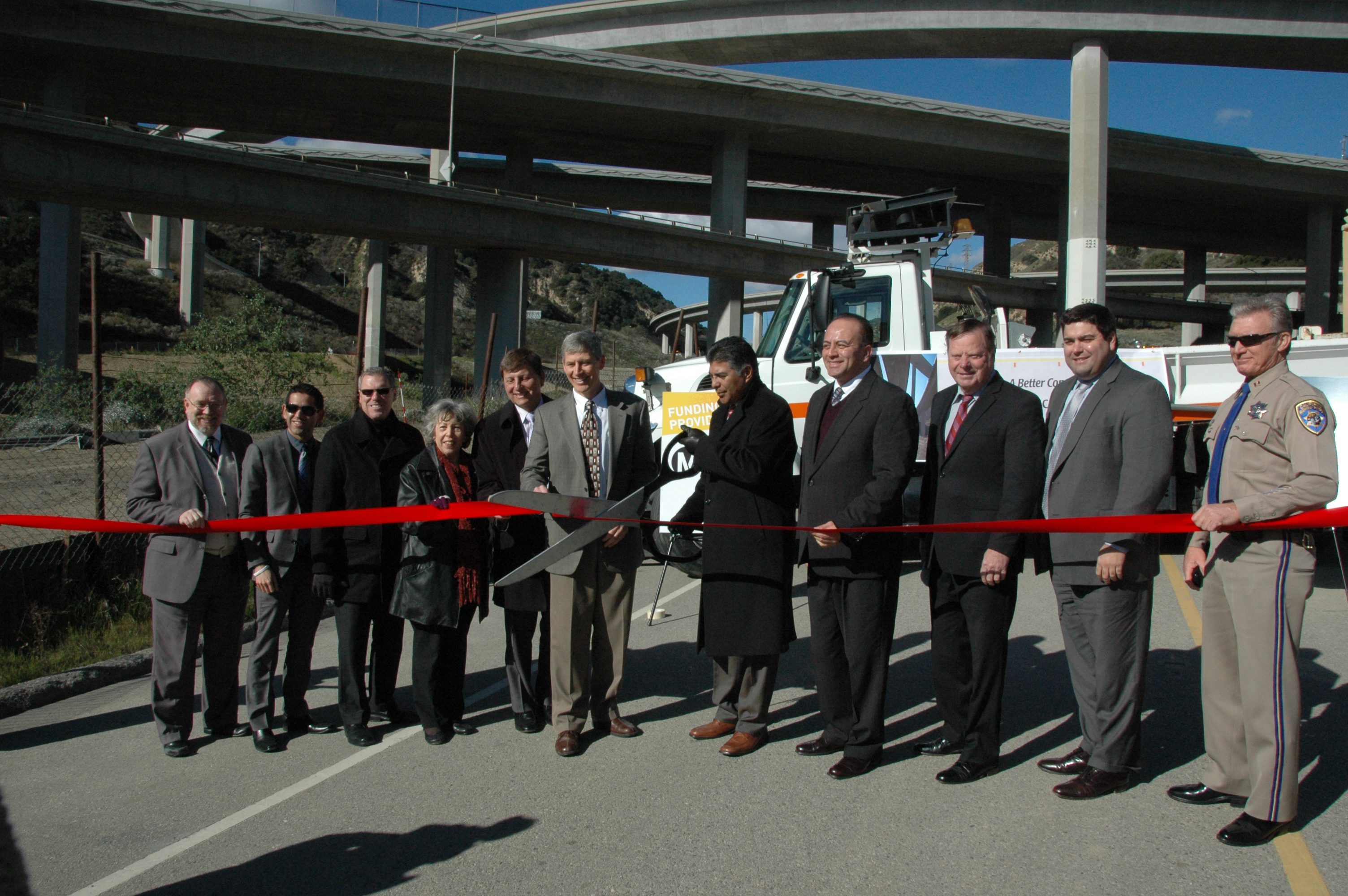 Officials cut the ribbon on the new HOV connector this morning. Rep. Tony Cardenas is holding the scissors. Photos by Luiz Inzunza/Metro. 