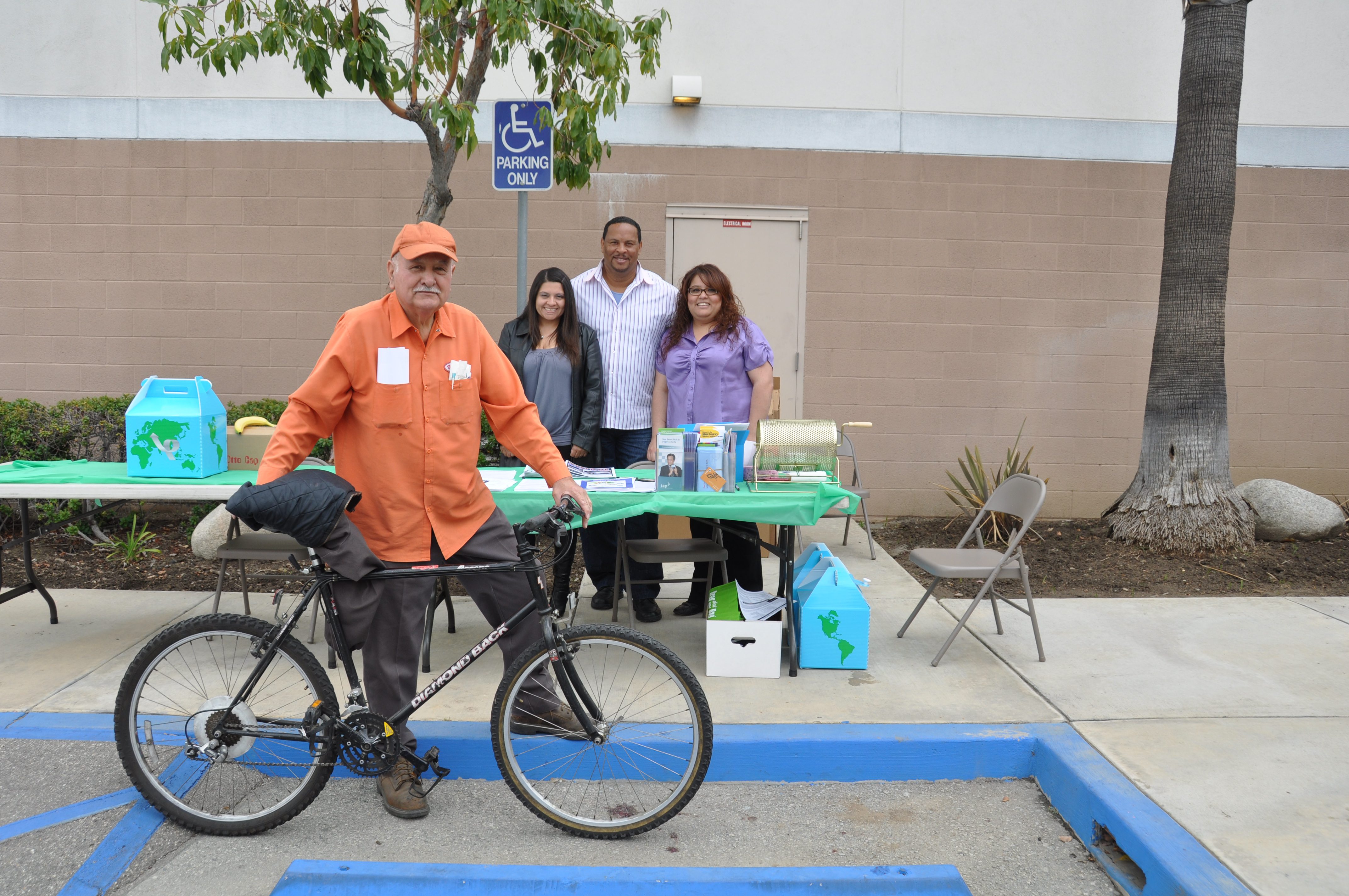 Mr. Baltierra and his bicycle at a City of Commerce rideshare event