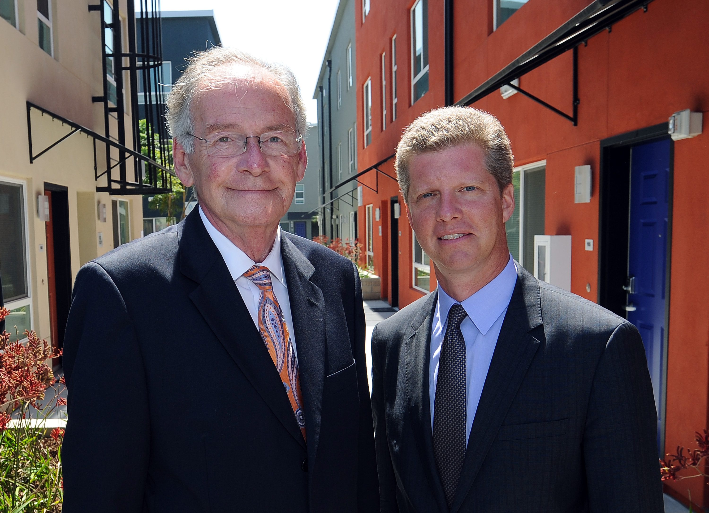 Metro's Chief of Real Property Roger Moliere (left)  with Housing Secretary Shaun Donovon at Metro's transit oriented development near MacArthur Park 