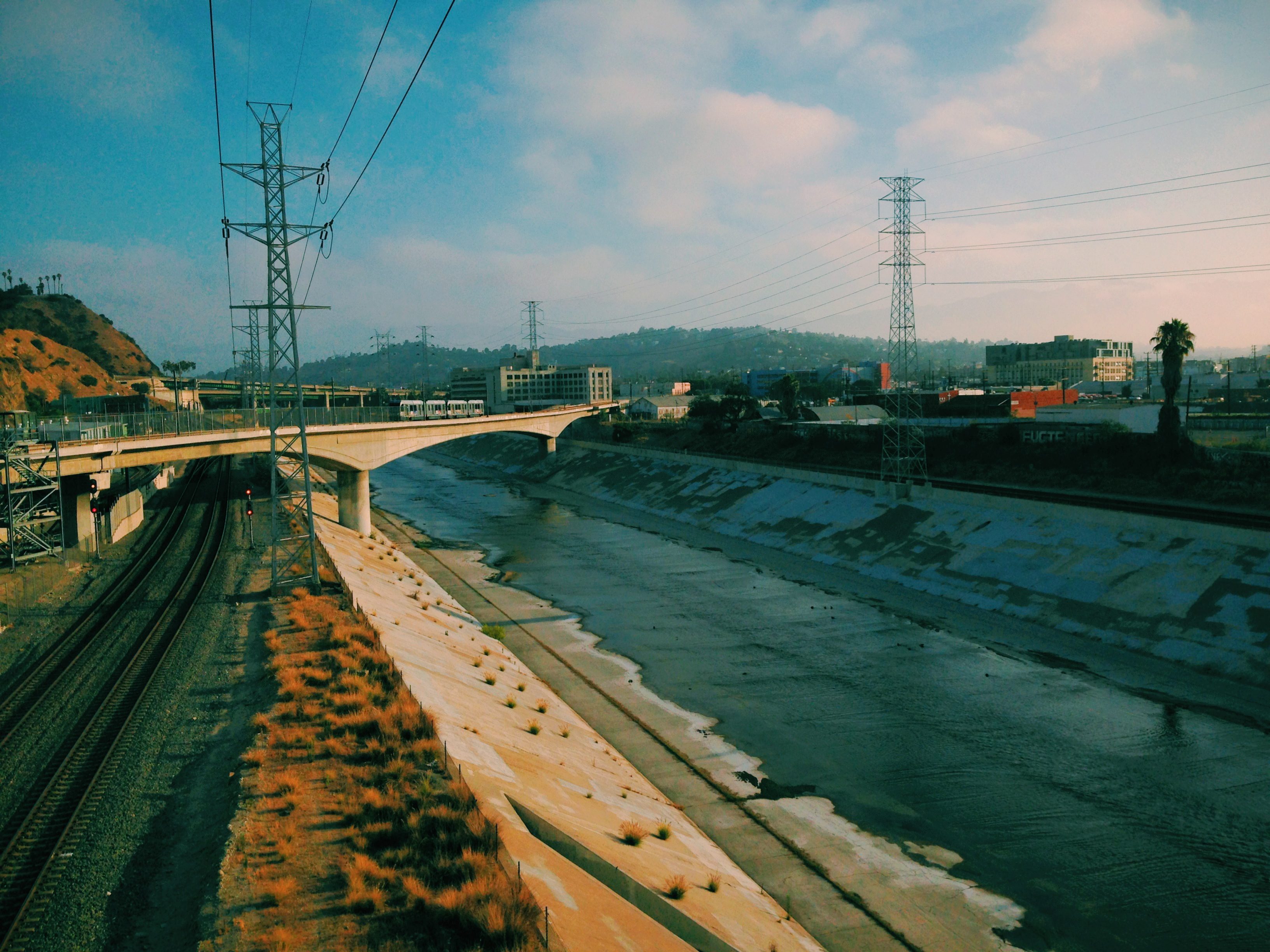 The L.A. River and the Gold Line as seen this morning from the Broadway Bridge. The photo was taken with the VSCOcam app for iPhone. Photo by Steve Hymon/Metro. 