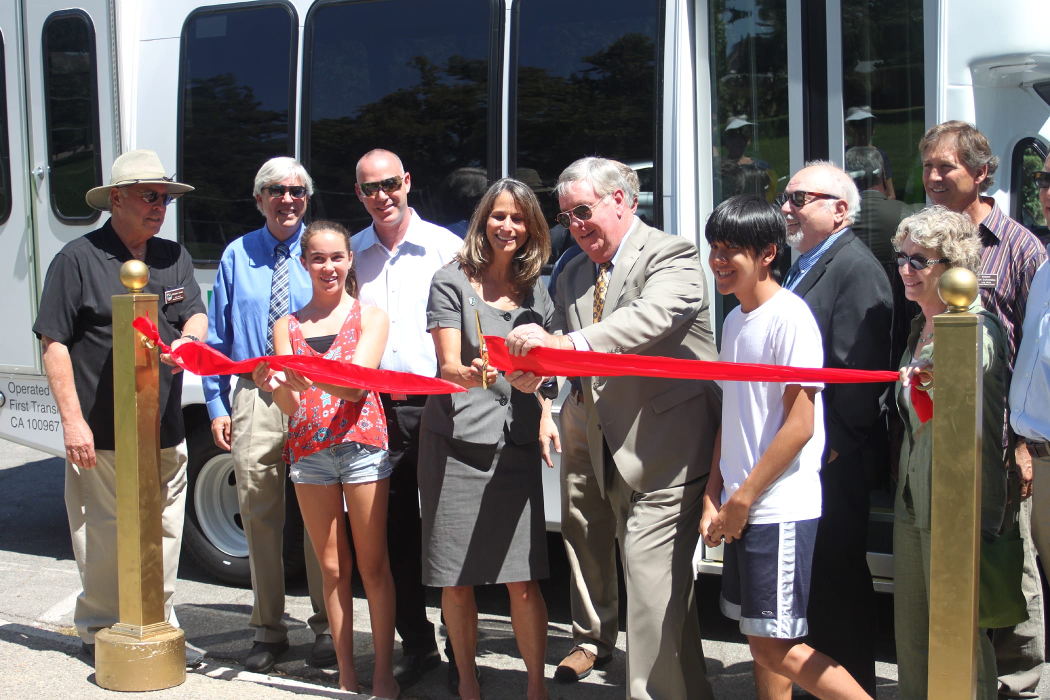 County of Ventura Supervisor Linda Parks and Agoura Hills Mayor Denis Weber, joined by local community members, celebrate the Kanan Shuttle. Photo courtesy of Consortium Media.