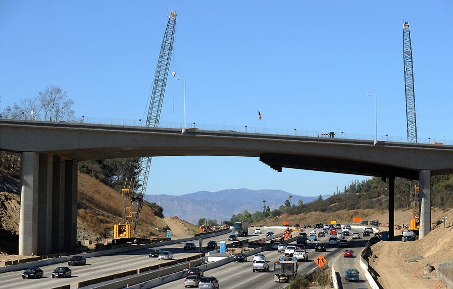 The new Mulholland Bridge is reaching completion.  Photo shows metal supports that have been removed from the Southbound 405. Saturday night they will be removed from the Northbound 405.