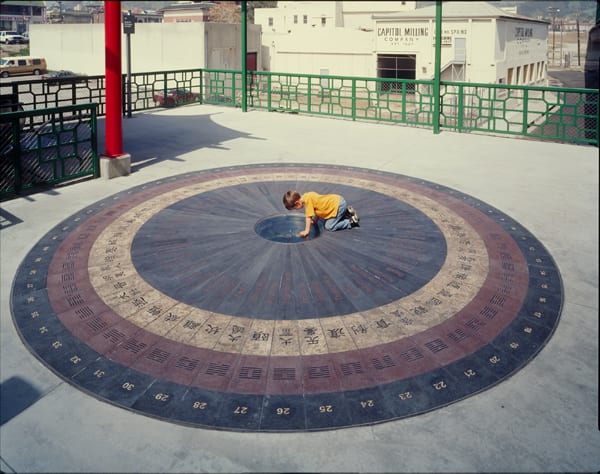 An I-Ching based compass and granite dial on the mezzanine, by Chusien Chang at Chinatown Station. Photo: Metro Creative Services.