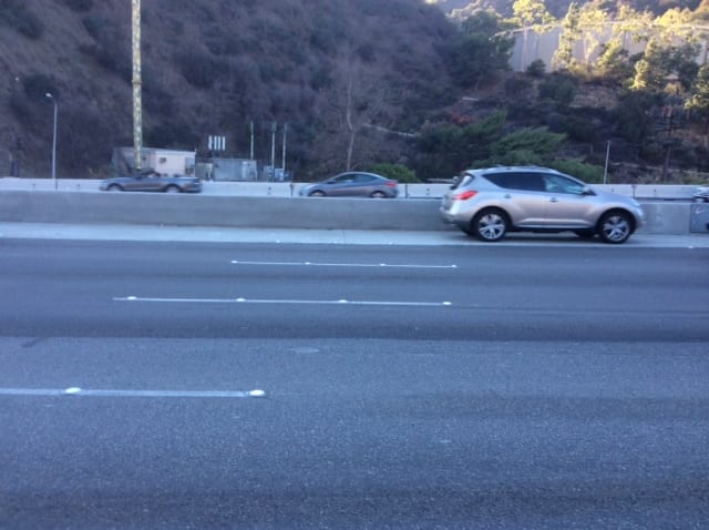 A car drives on the No. 1 lane that will receive a final pave during Jamzilla lane closures. 