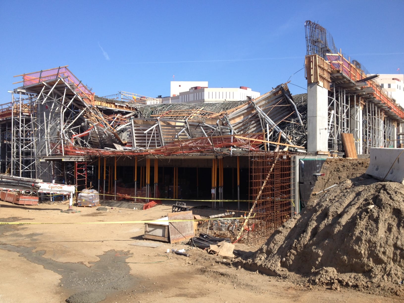 After the collapse of the third level of the multi-level bus parking garage under construction at Division 13. Photo: Paul Gonzales/Metro