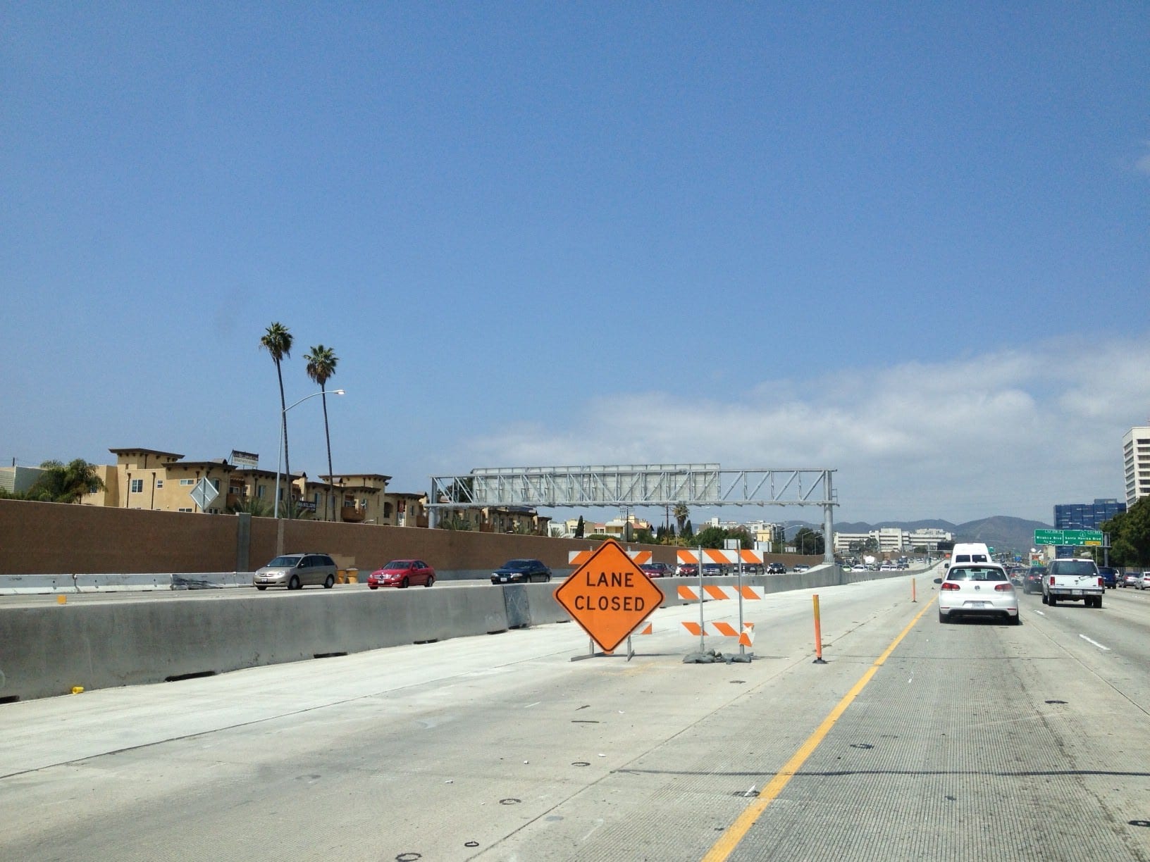 Earlier lane preparation work on northbound carpool lane in West L.A.