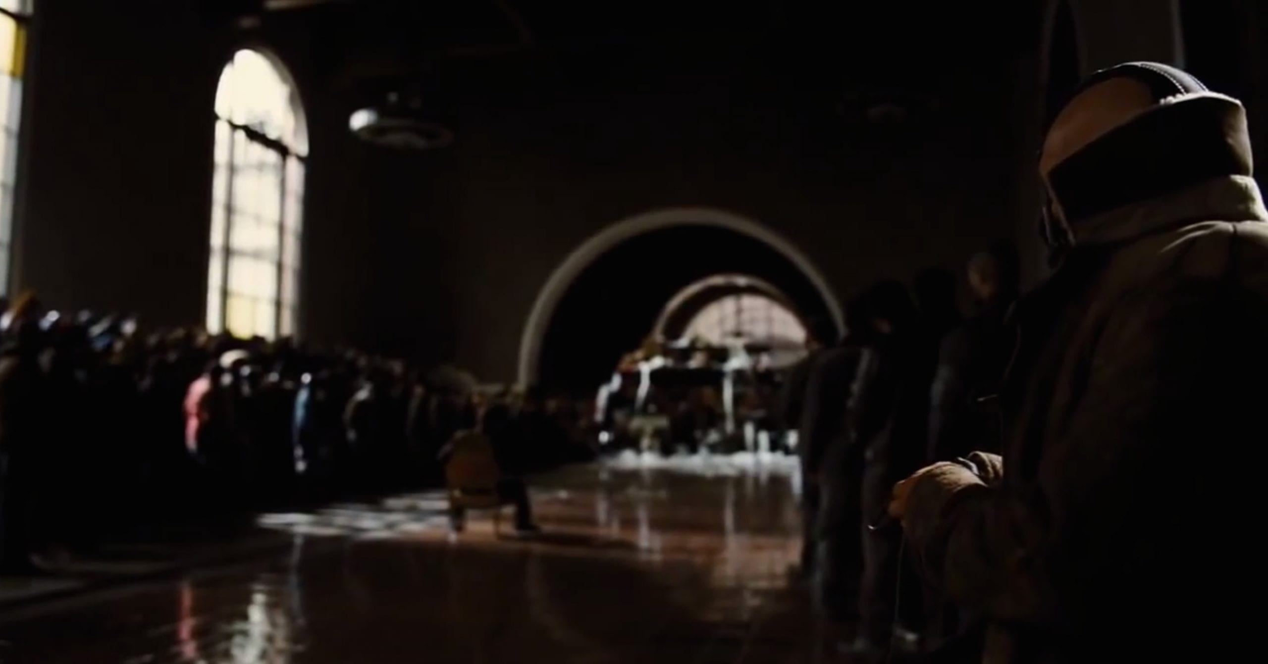 A scene from the "The Dark Knight Rises" that was filmed in the old ticket room at Union Station. Credit: Warner Bros.