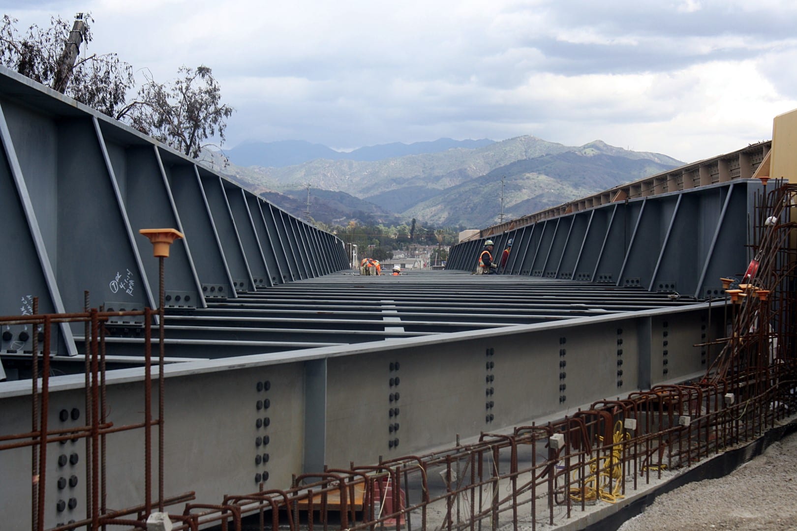 ART OF TRANSIT: Looking north to the San Gabriel Mountains from the bridge that will carry the Gold Line Foothill Extension over Foothill Boulevard in Azusa. Awesome photo by Gold Line Foothill Extension Construction Authority.