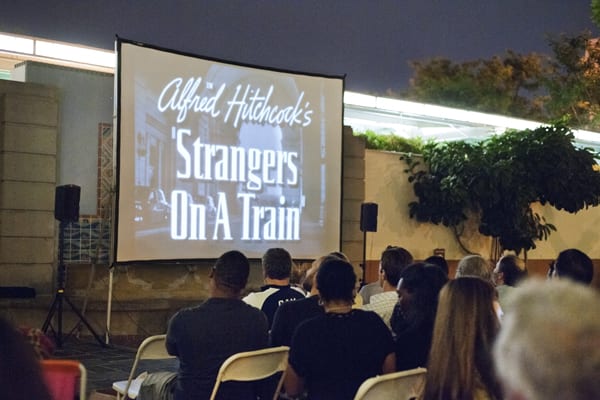 Screening of Alfred Hitchcock's Strangers on a Train in the North Patio, in September 2013. The event was presented in partnership with the Echo Park Film Center.