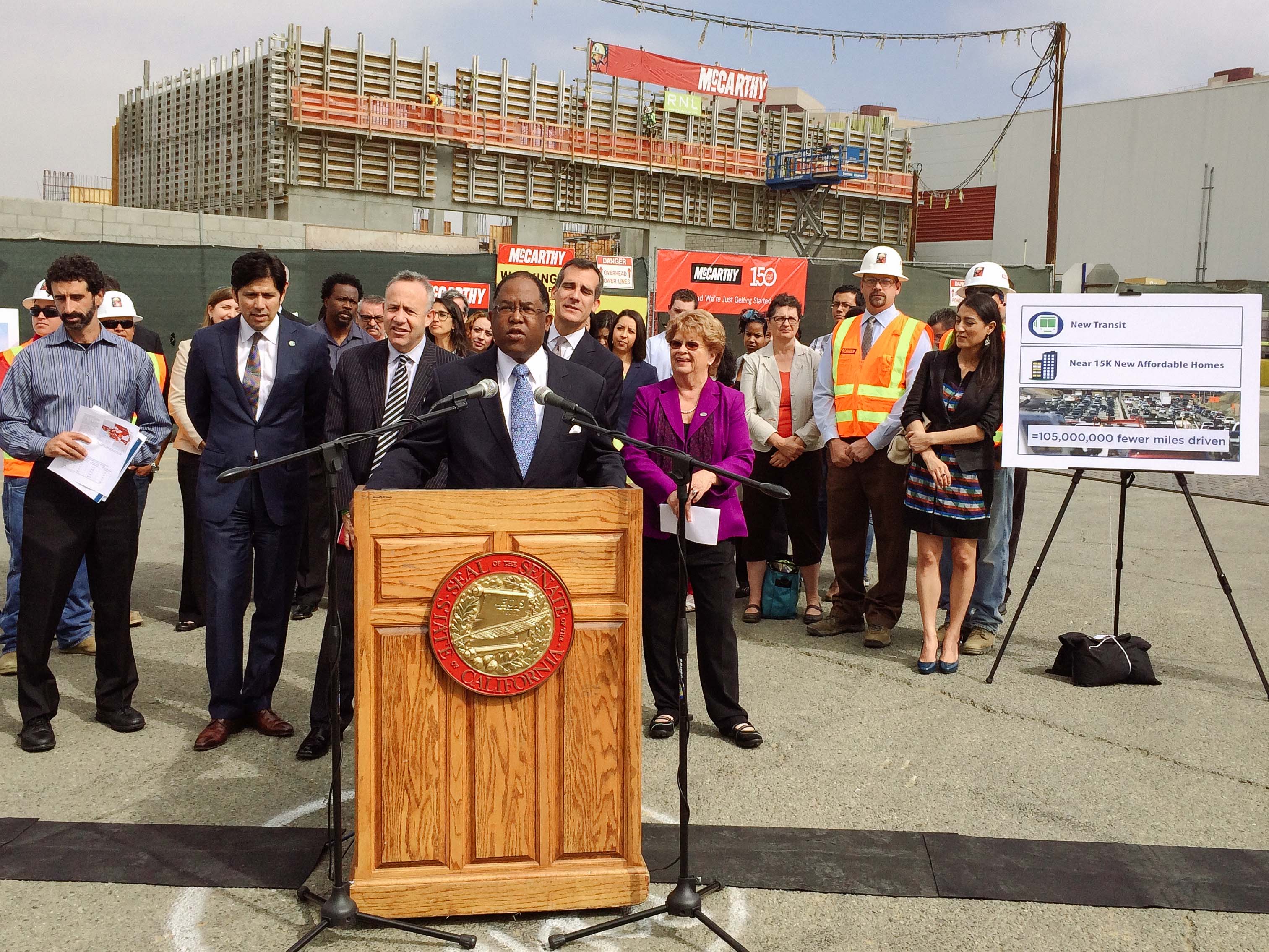 A media event was held Friday morning at Metro's Division 13 facility to promote cap-and-trade efforts in the state and the regional benefits of reducing greenhouse gases. Supervisor Mark Ridley-Thomas is at the podium in the above photo. Behind him, from left, are Senator Kevin de Leon,  Senate President pro Tempore Darrell Steinberg, Los Angeles Mayor Eric Garcetti and Metro Board Chair Diane DuBois. Photo by Luis Inzunza/Metro. 