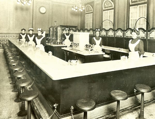 Harvey Girls at the original Dearborn Station in Chicago, before the city had a Union Station. From Appetite for America, courtesy of the Gordon Chappell Collection, Denver Public Library.