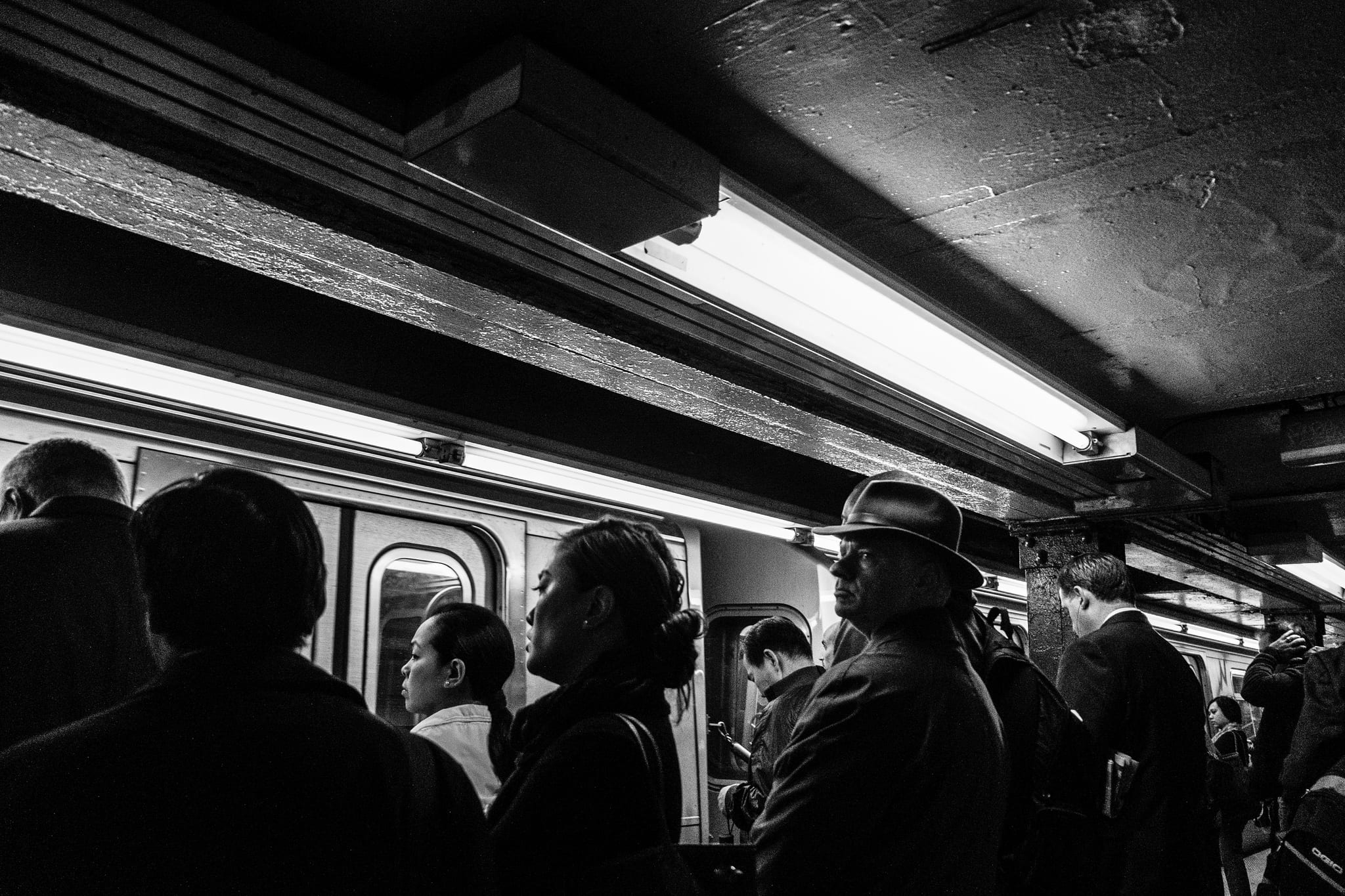 Passengers board the New York subway in September. Photo by Jim Pennucci, via Flickr creative commons. 