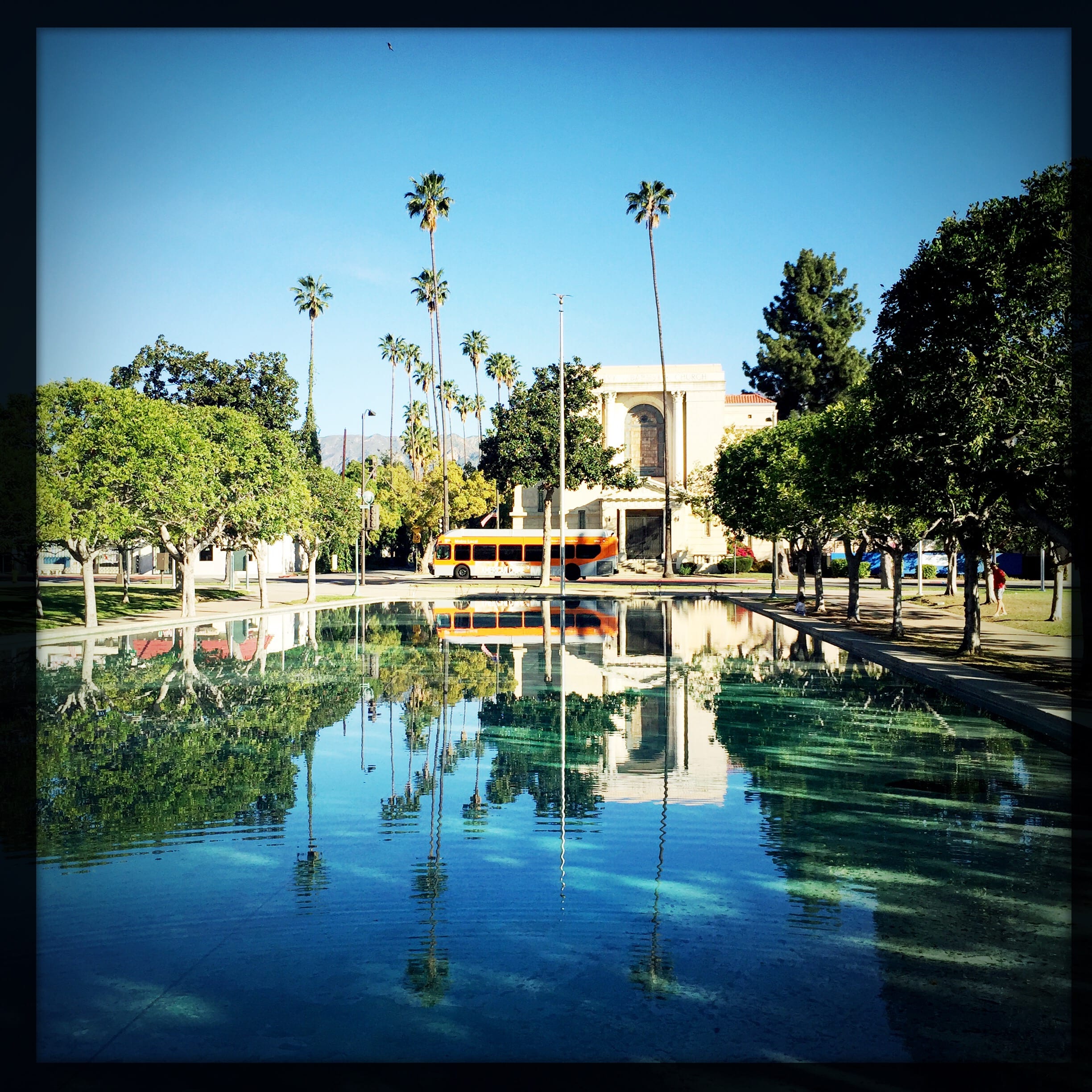ART OF TRANSIT: The Metro Local 181 passes by the fountain at Pasadena City College on Saturday morning. Photo by Steve Hymon/Metro.