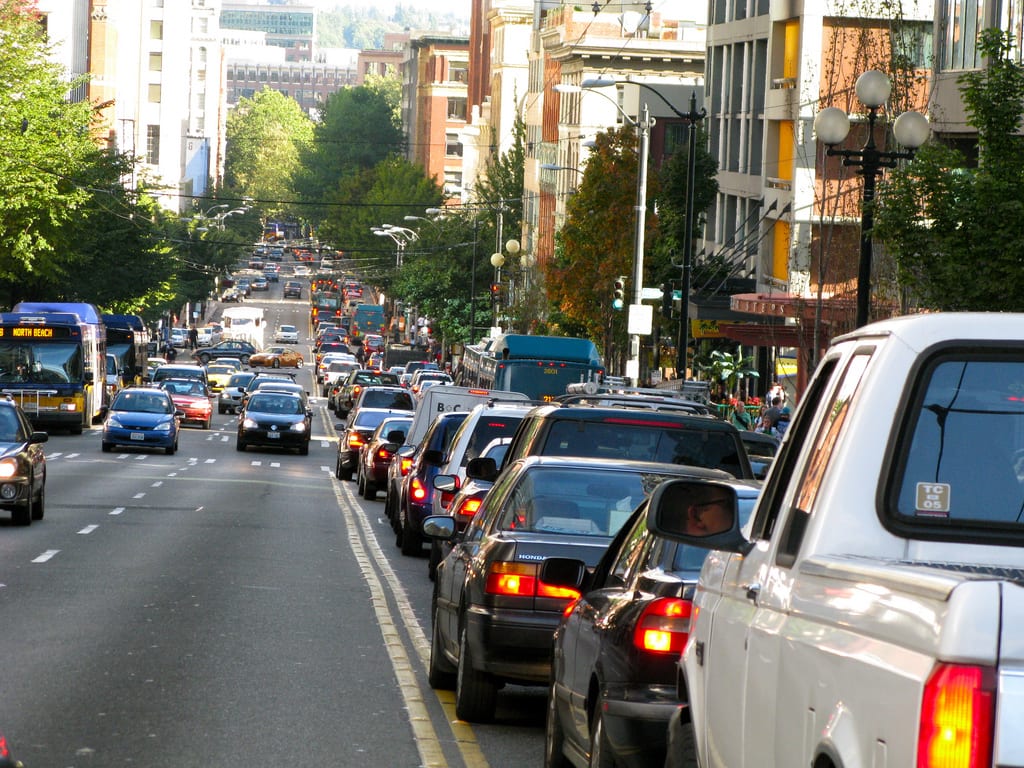 Downtown Seattle vs cars. Photo by Oran Viriyincy via Flickr creative commons. 