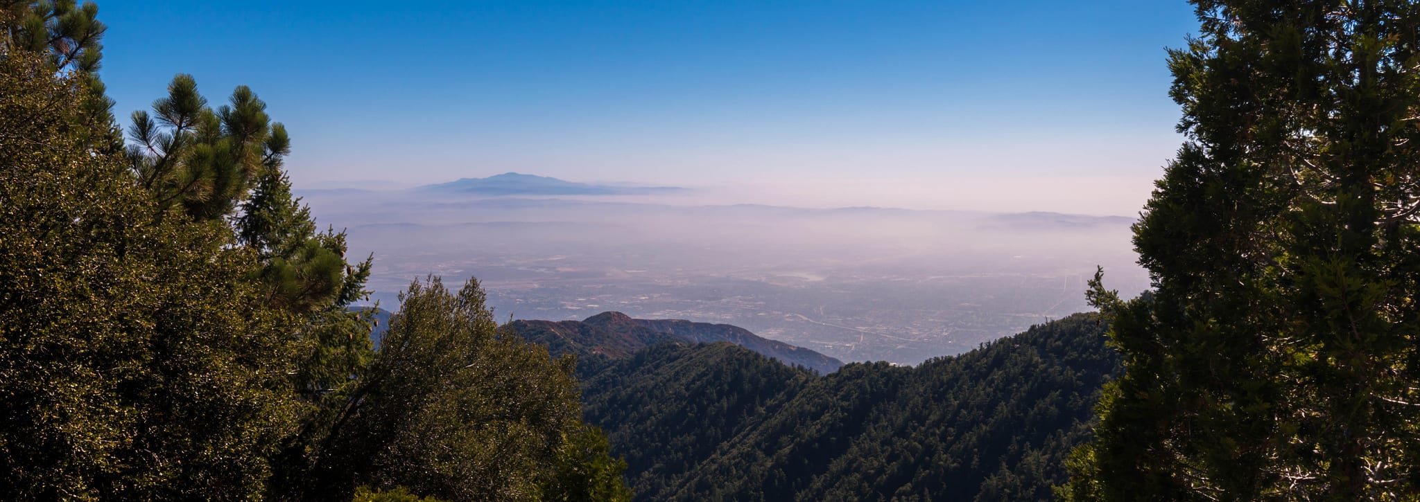 Smog in the San Gabriel Valley and beyond as seen from Mt. Wilson. Photo by Bryan Ungard, via Flickr creative commons. 