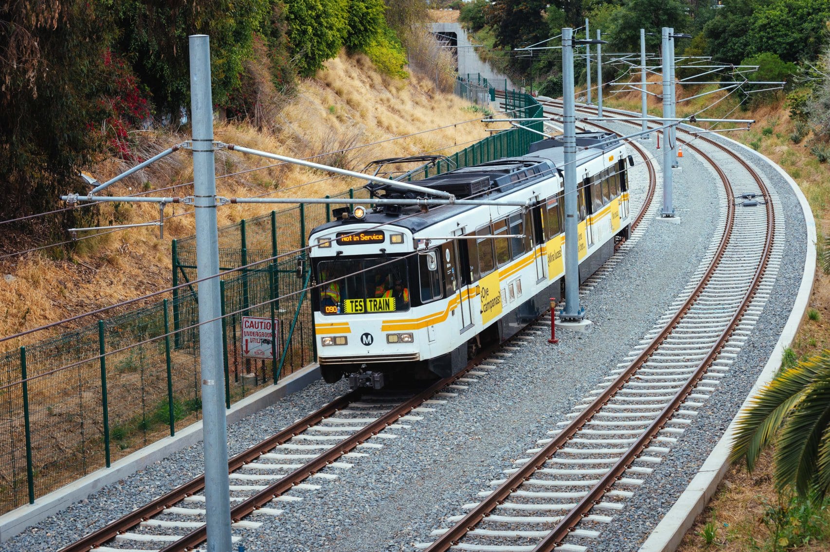 The challenge is figuring out a path on nearby streets for the Expo Line 2 pathway roughly adjacent to this stretch of tracks through the Northvale trench. Photo: Metro.