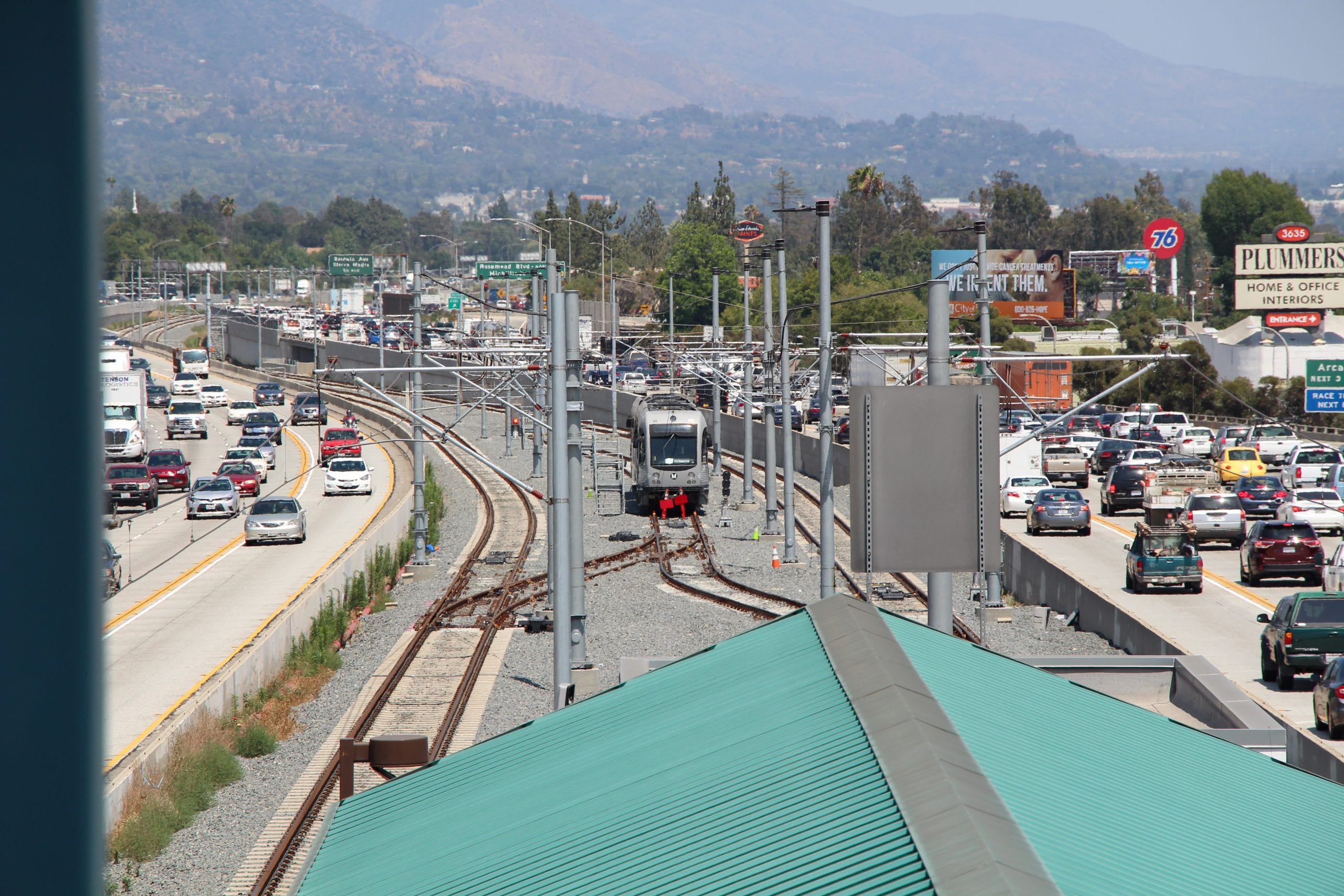 A Gold Line test train leaving the current terminus at Sierra Madre Villa and headed toward Arcadia in the median of the 210 freeway. Photo: Foothill Gold Line Construction Authority.