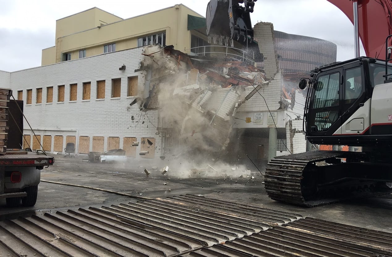 Work is underway on demolishing one residential building and two commercial properties to make way for two construction staging yards near the future Wilshire/La Cienega Station for the Purple Line Extension. Photo: Metro.