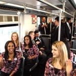 Rose Queen Drew Helen Washington, at left, and Royal Court on board Gold Line train to Pasadena.