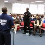 Union representative answers question from resident about job requirements. Photo by Allison Mannos/LAANE