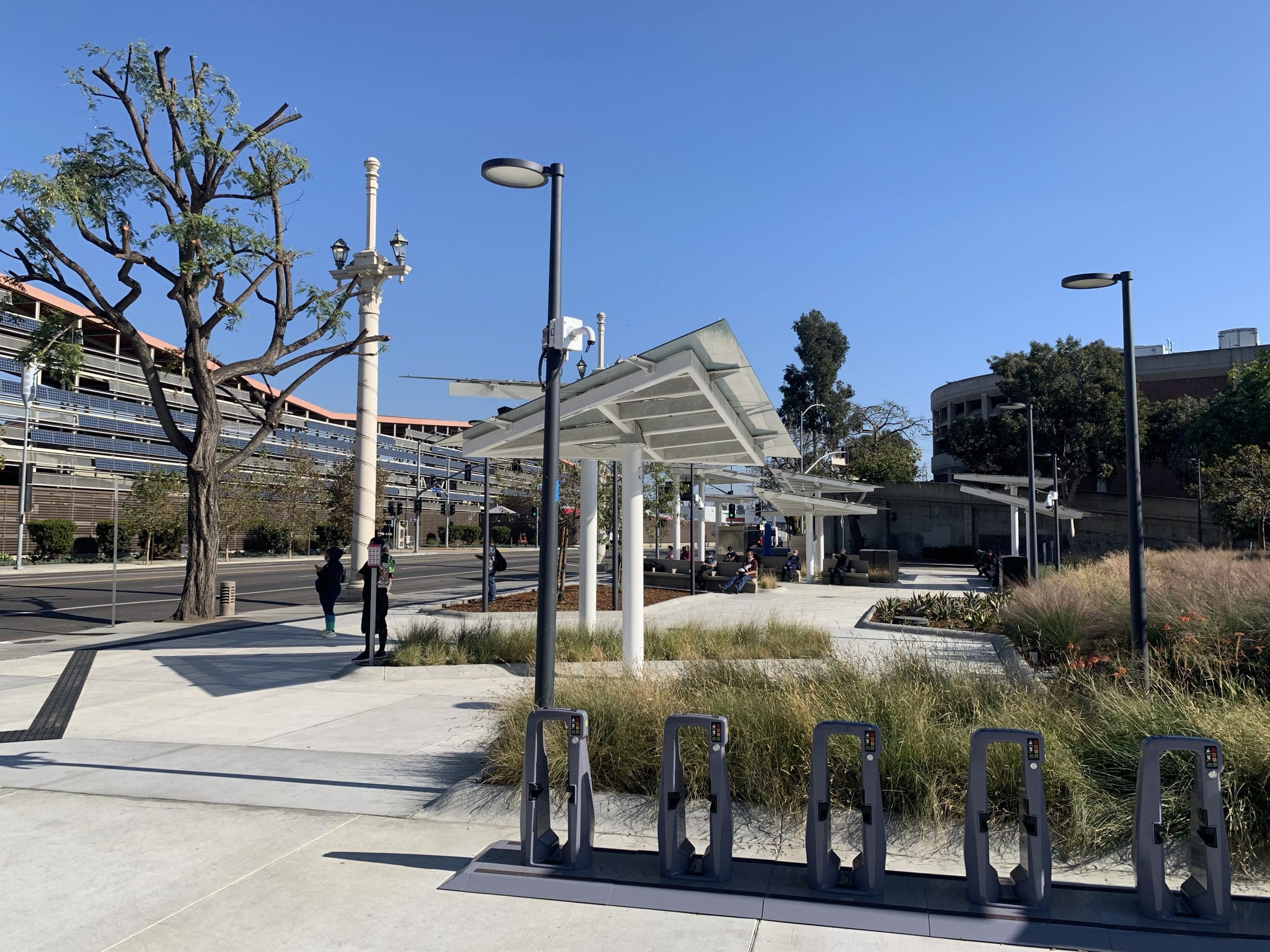 Cesar Chavez Transit Pavilion with shade canopies and landscaping