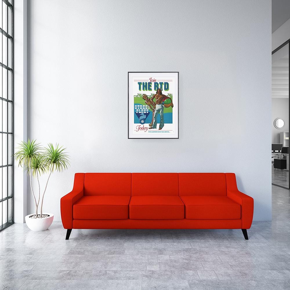 Waiting room with framed Join the RTD poster and red sofa