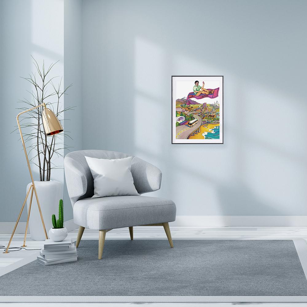 staged room with brushed gold standing lamp and light gray arm chair, grey rug and pale gray wall displaying framed RTD pleasure fare poster
