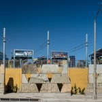 "The Crying Rock and Saint Monica" in context at Downtown Santa Monica station with platform above.