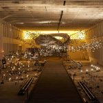 "In the Light of the Shadow" is a previous installation MASS MOCA by AMC artist Glenn Kaino.