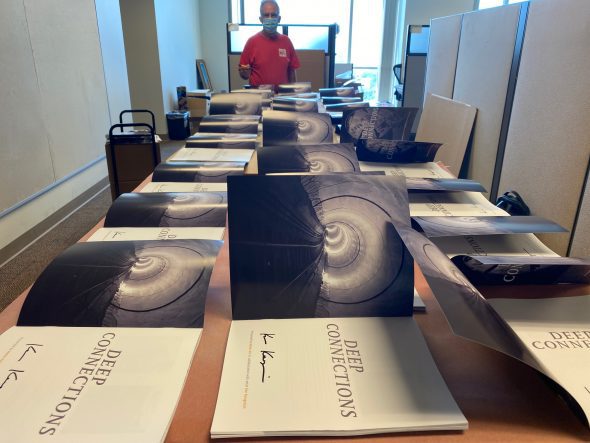 The artist signs a limited selection of catalogs at Metro Headquarters.