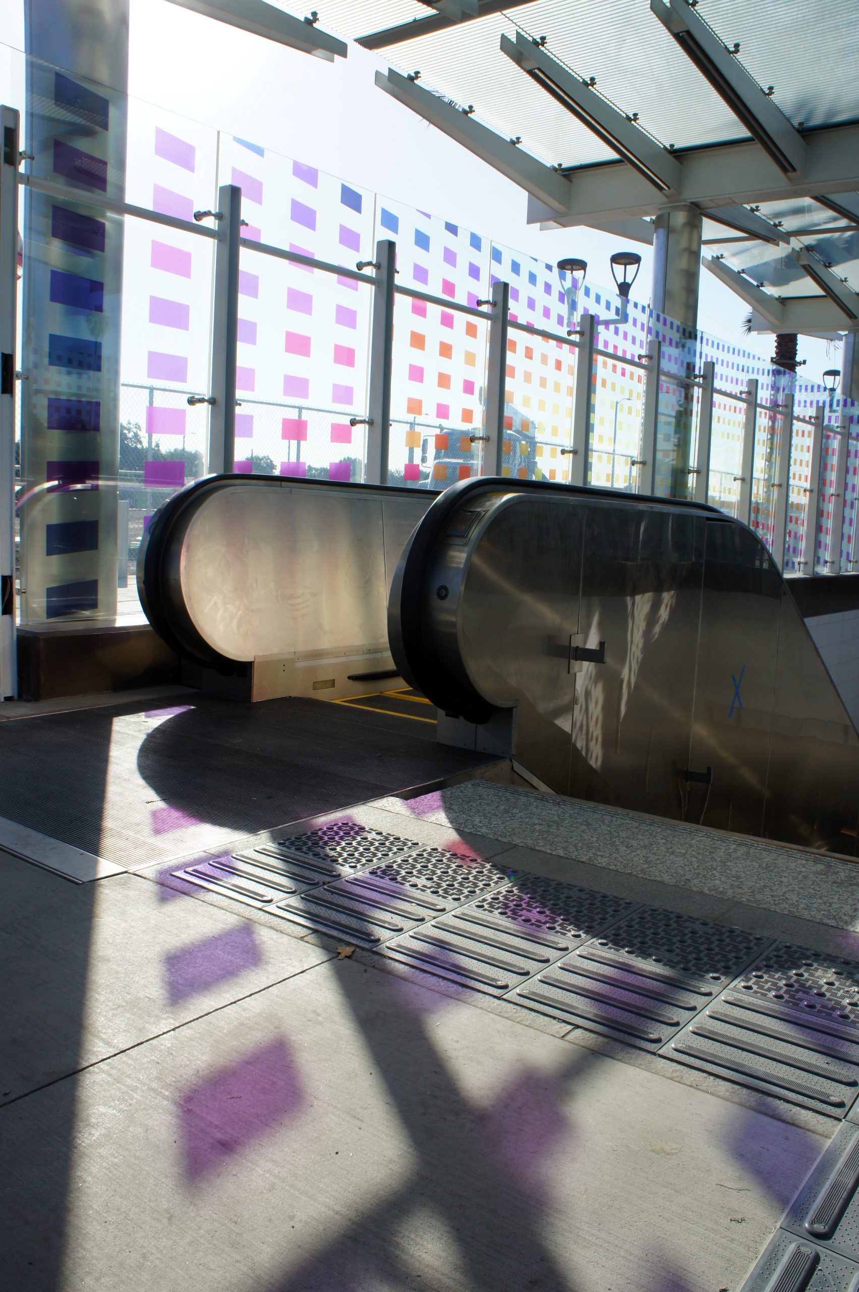 Vibrant and colorful patterns refract into the station’s interior