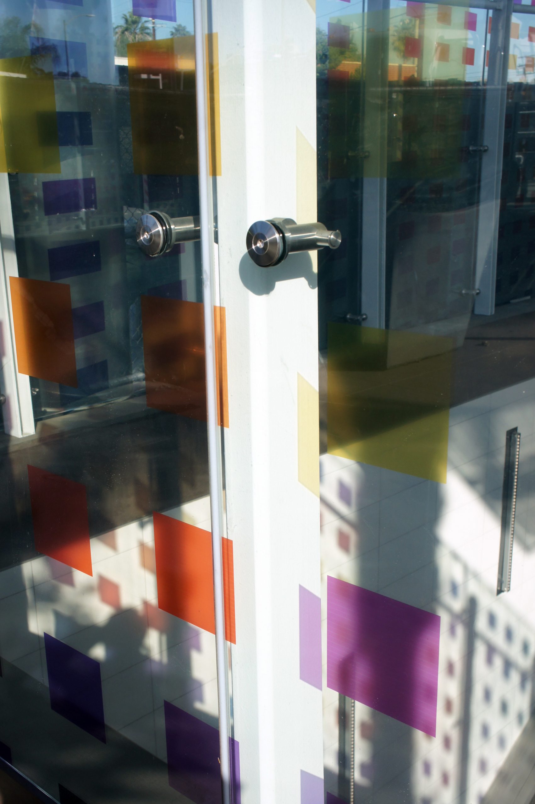 Details of color spots cast throughout the station