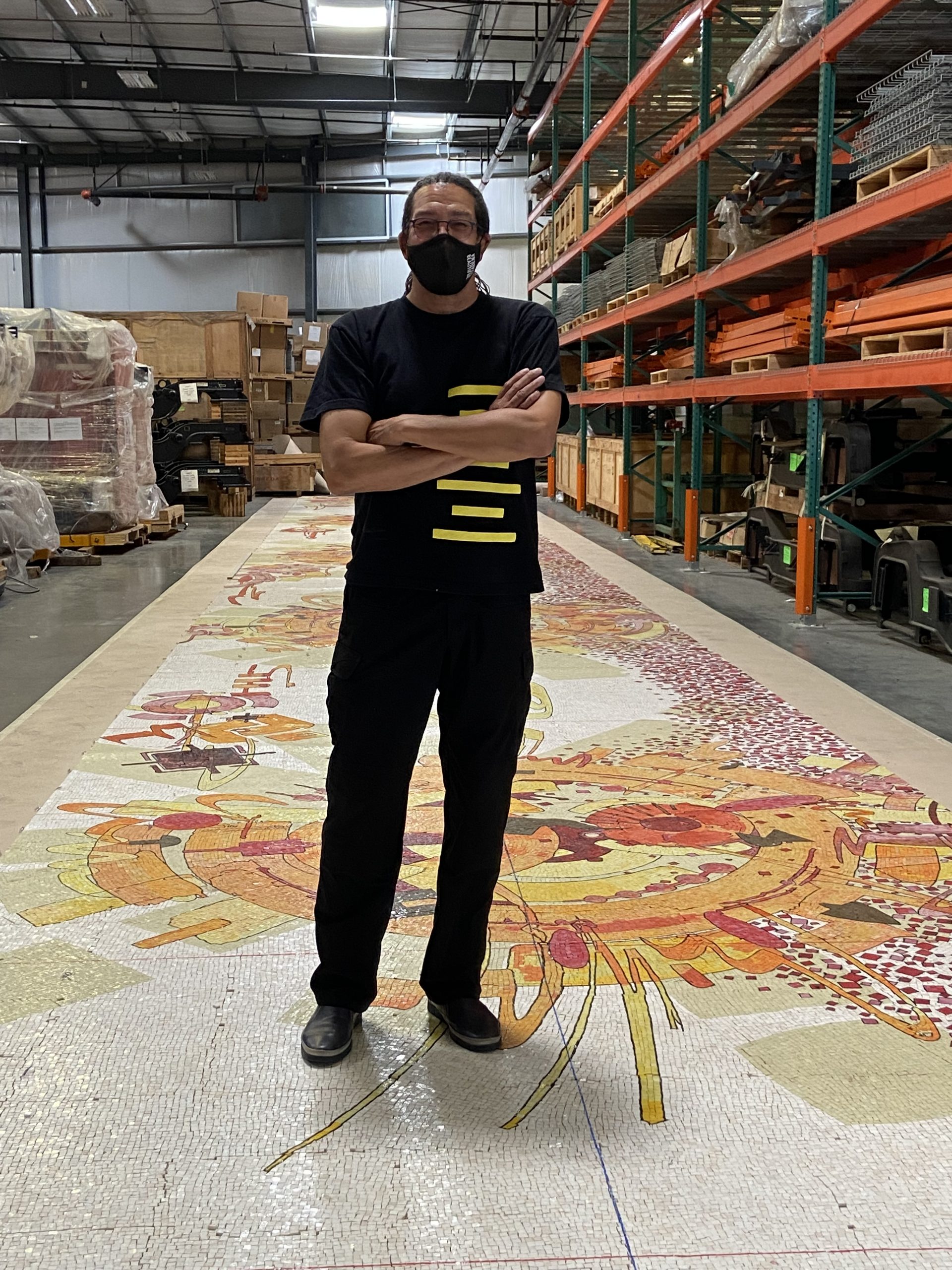 Mark Steven Greenfield and his mosaic mural work-in-progress for the Regional Connector Transit Project.