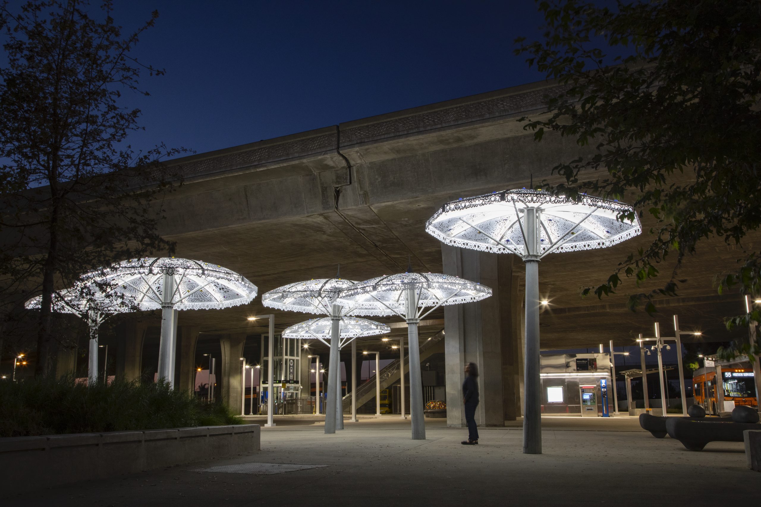 Evening view of the "Second Line" parasol sculptures at our newly completed Willowbrook/Rosa Parks transit hub.