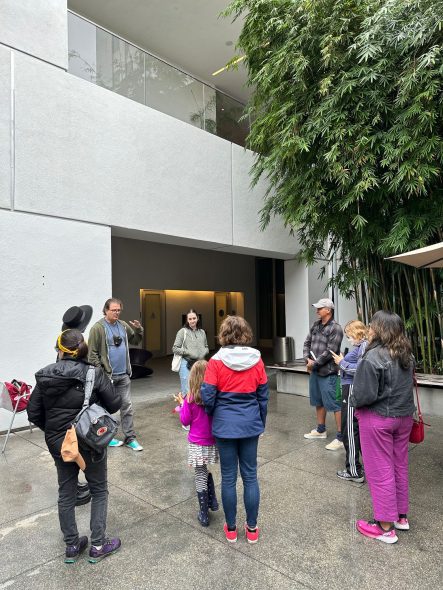 The group gathers to share their experience and drawings after finishing the workshop at Hammer Museum.