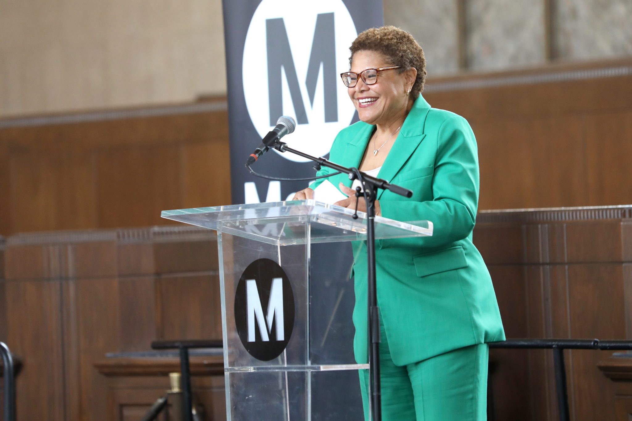 L.A. Mayor and Metro Board Chair Karen Bass speaking at the podium.